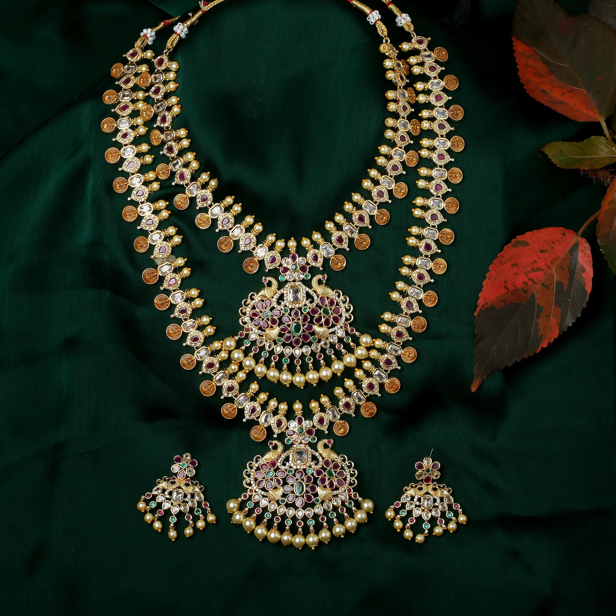 Estele Gold Plated CZ Peacock with Coins Designer Bridal Short & Long Necklace set with color stones & Pearls for Women